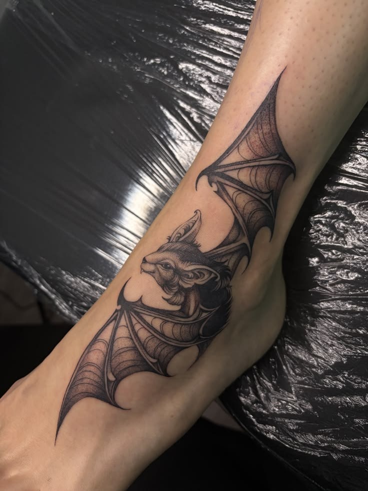 Elegant Bat with Long Wing Detail Tattoo Design