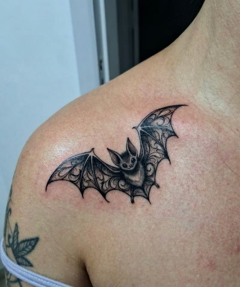 Smoky Black Bat with Dramatic Shoulder Shape Tattoo Design