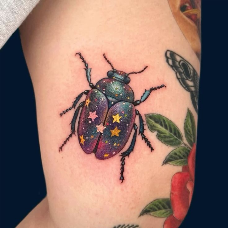 Black Stag Beetle with Floral Detail Tattoo Design