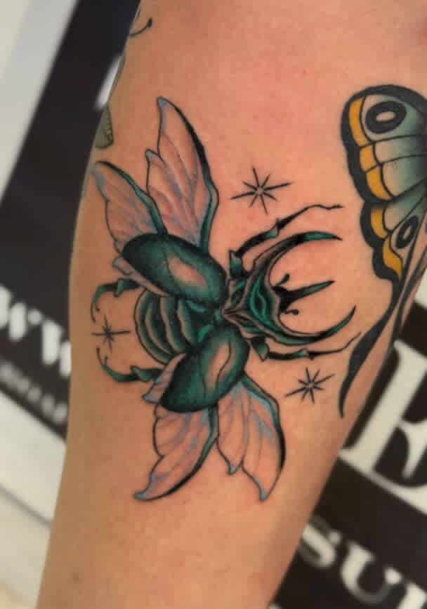 Blue Atlas Beetle with Extended Wings Tattoo Design
