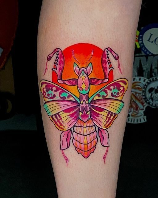 Delicate Floral Beetle with Soft Green Accents Tattoo Design