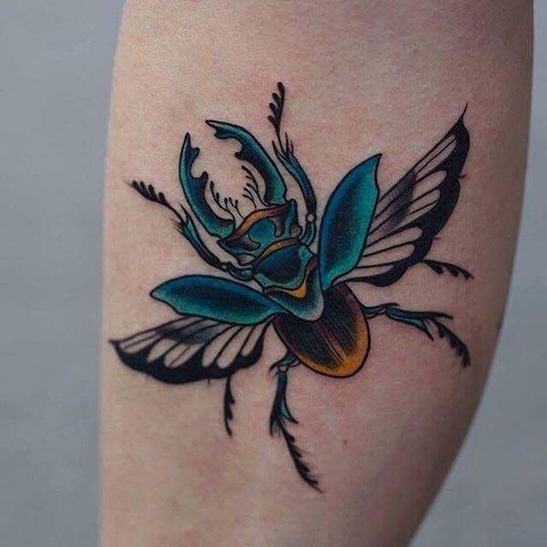 Golden Amber Beetle in Warm Color Tattoo Design