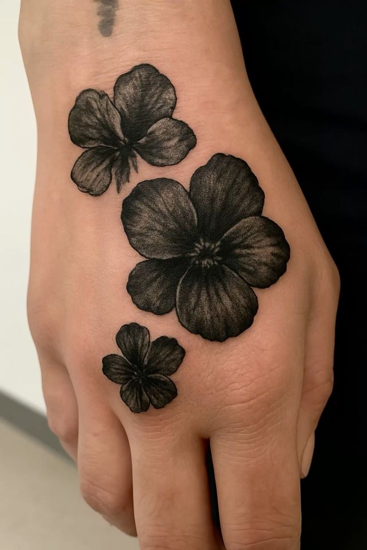 Elegant Black Floral Hand Tattoo Tattoo Design