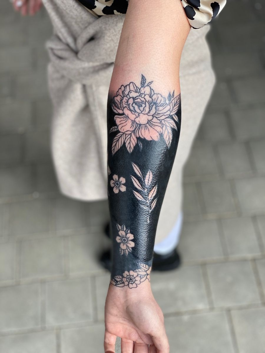 Floral Blackout Forearm Tattoo Design