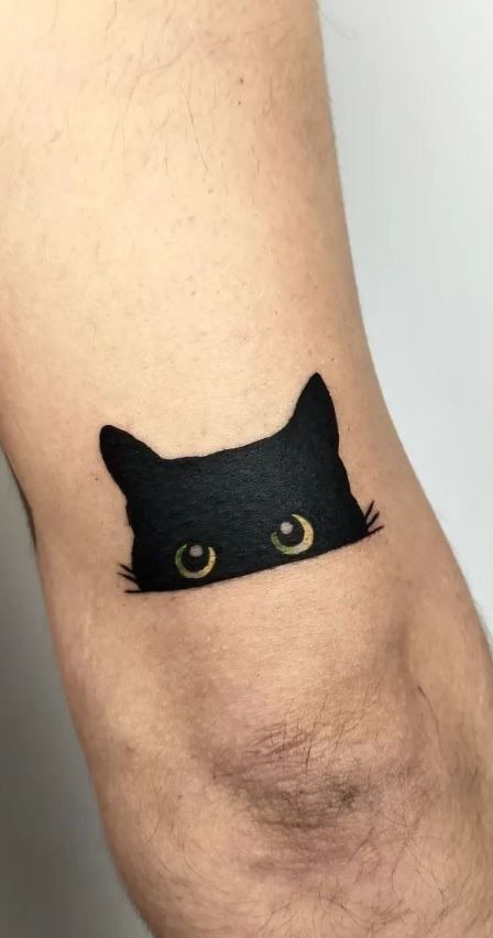 Playful Minimalist Cat Silhouette Tattoo Design
