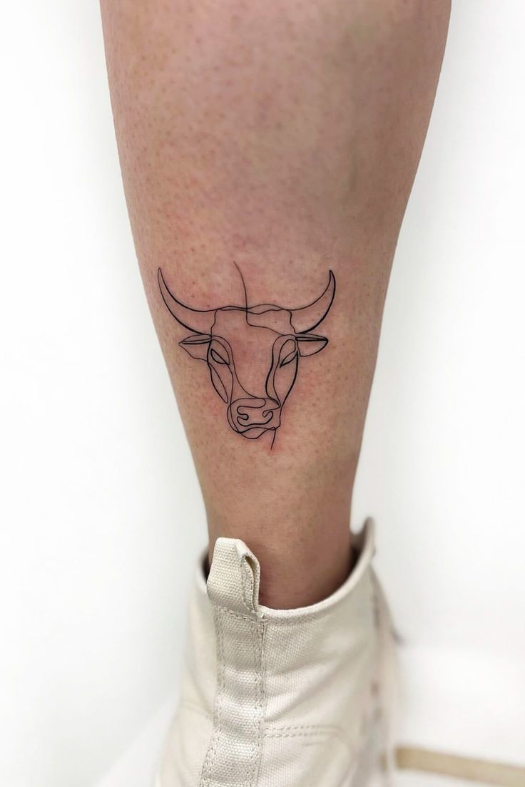 Bold Black Bull Tattoo with Abstract Energy Tattoo Design