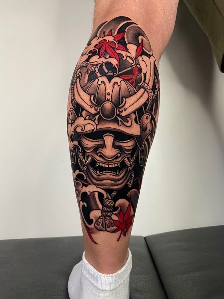 Coiled Snake on the Side of the Calf Tattoo Design