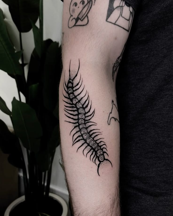 Fine Line Faces and Crawl Tattoo Design