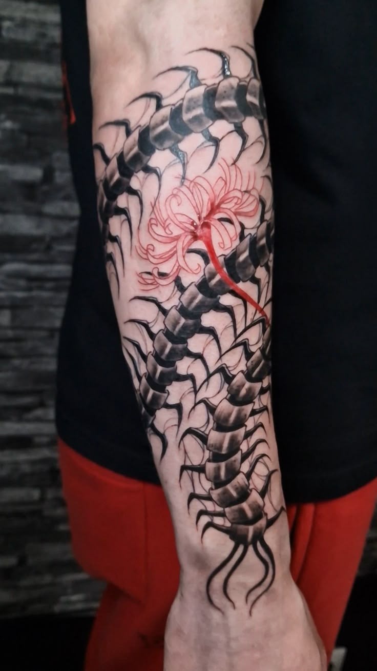 Spine-Hugging Beauty with Spider Lily Tattoo Design