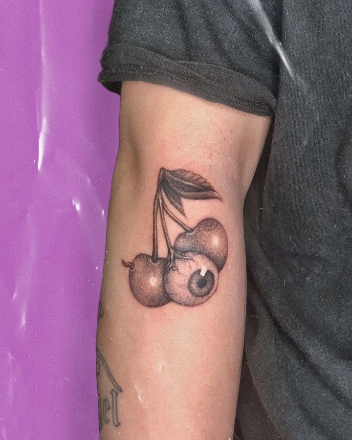 Realistic Cherry with Bite Detail Tattoo Design