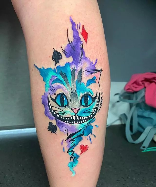 For those with an artistic side, this watercolor tattoo offers a splash of color and abstract flair.
