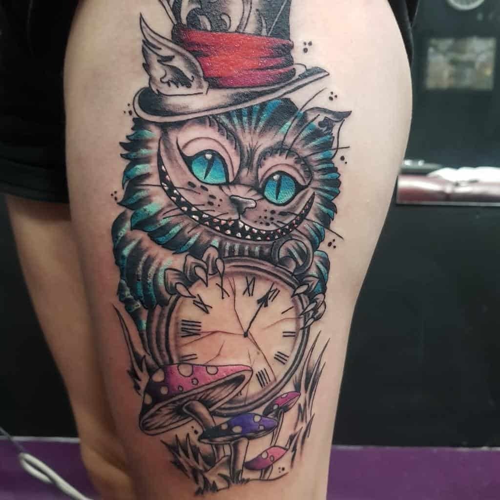 A unique spin on the Cheshire Cat, this tattoo merges elements from Alice in Wonderland with a steampunk twist.