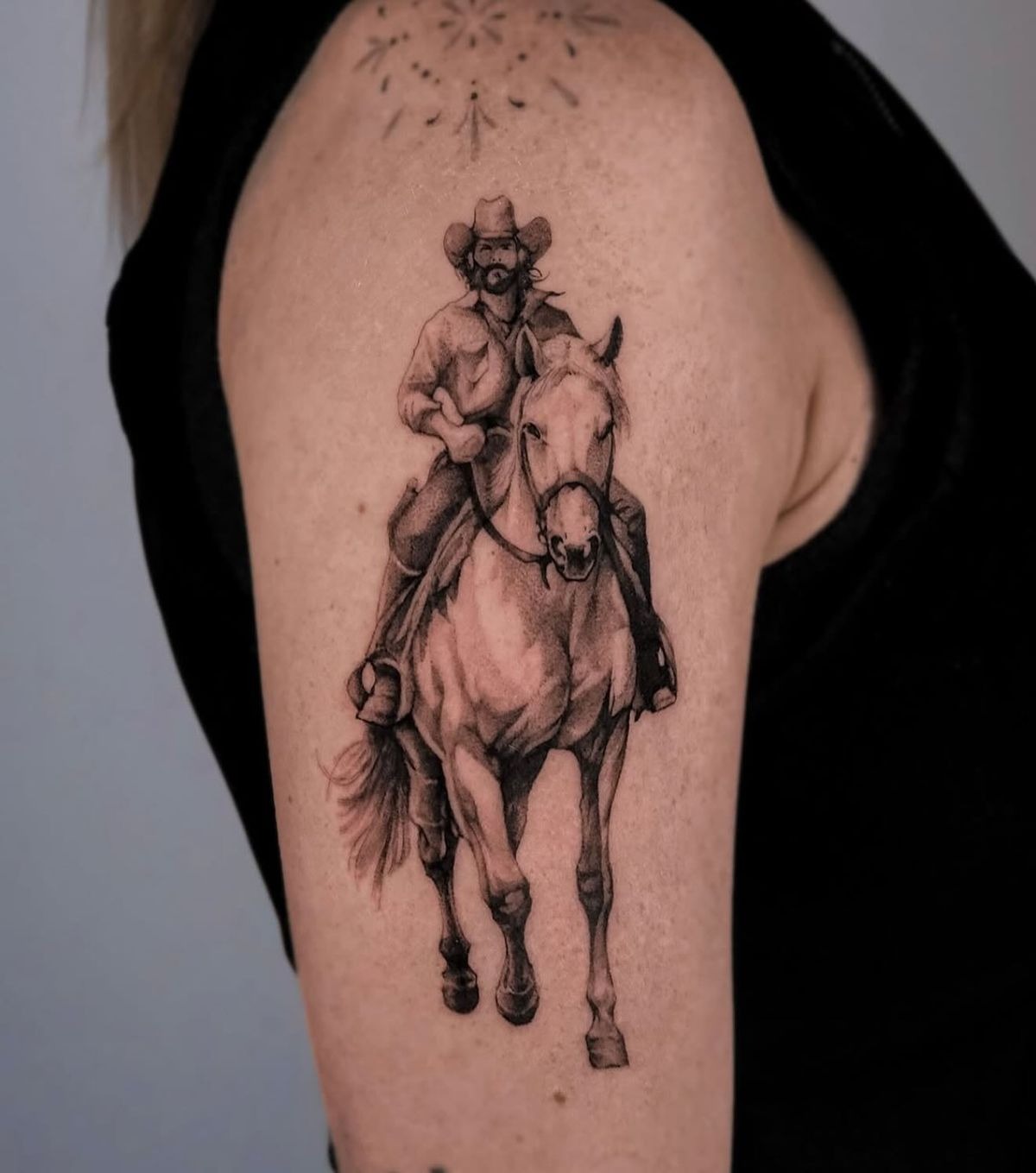 Lone Rider on the Upper Arm Tattoo Design