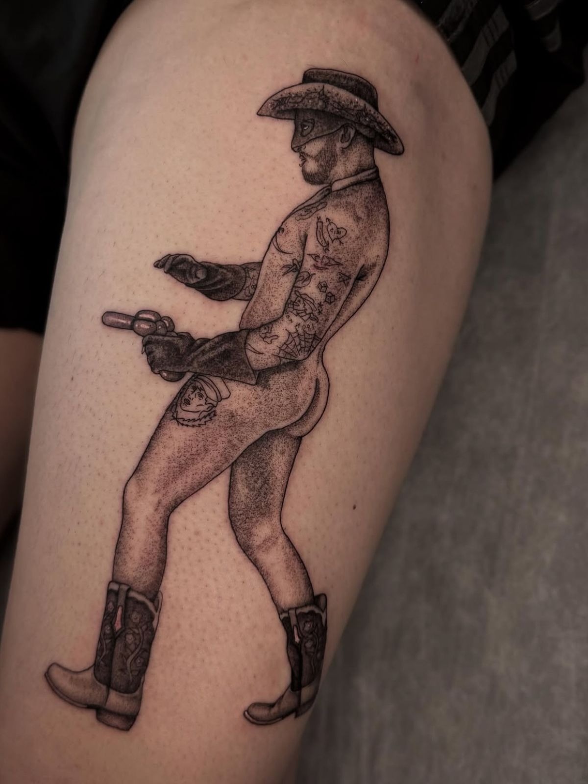 Playful Vintage Cowboy Figure Tattoo Design