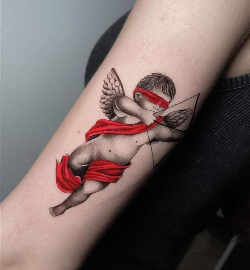 Blindfolded Red Ribbon Cupid Tattoo Design