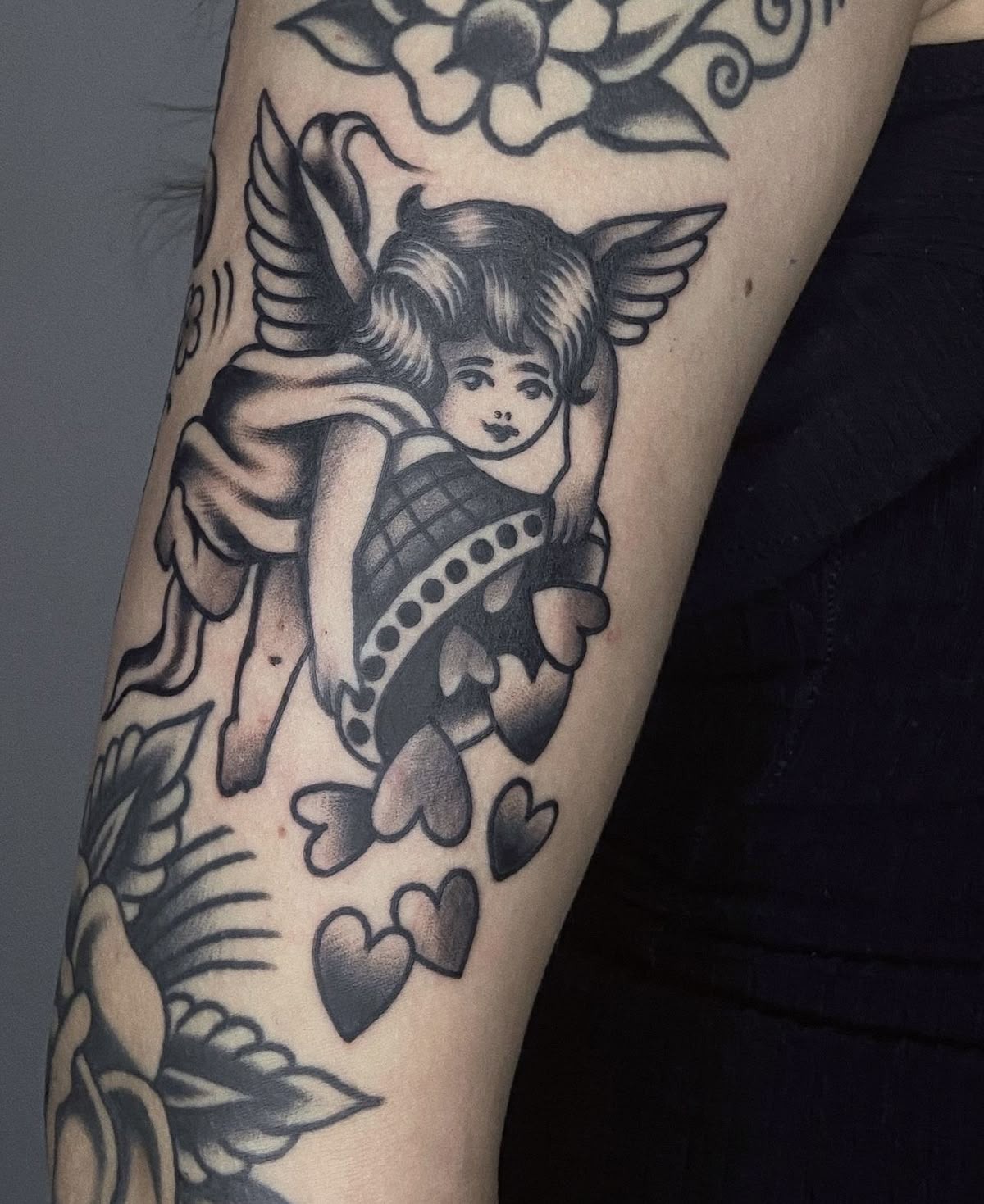 Gothic Sleeve Cherub with Hearts Tattoo Design