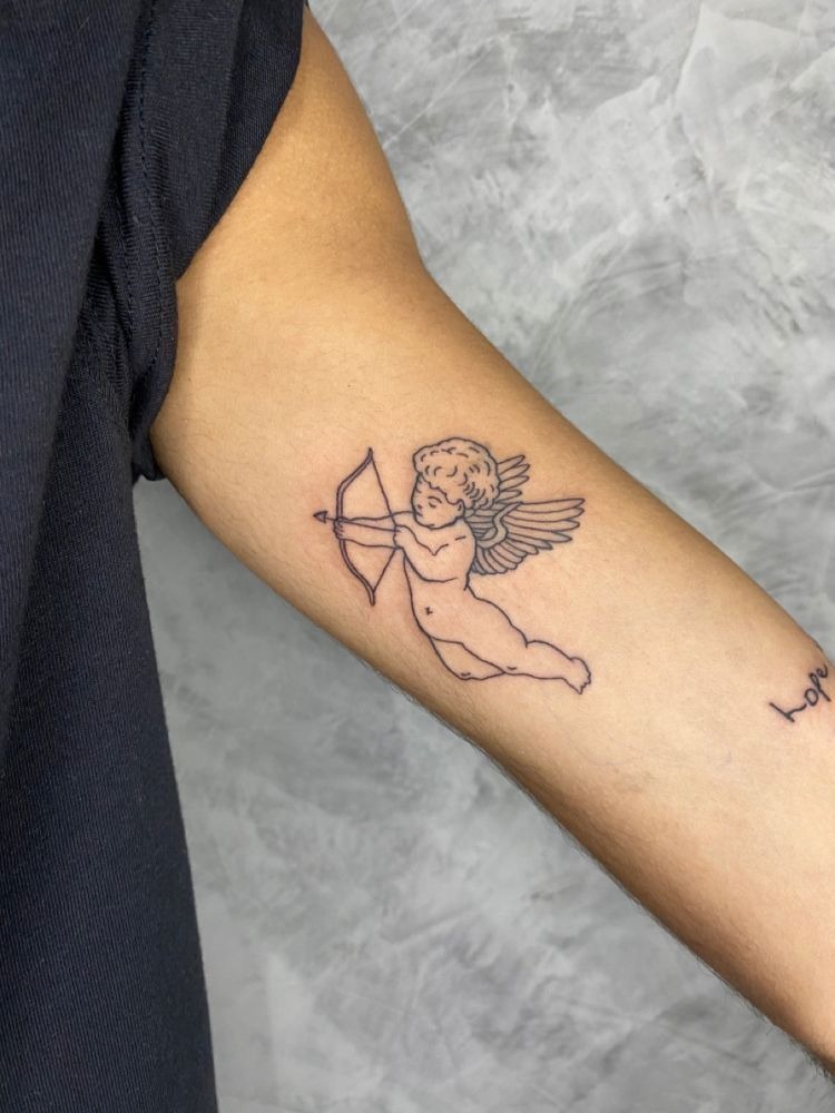 Minimal Fine Line Cupid Tattoo Design