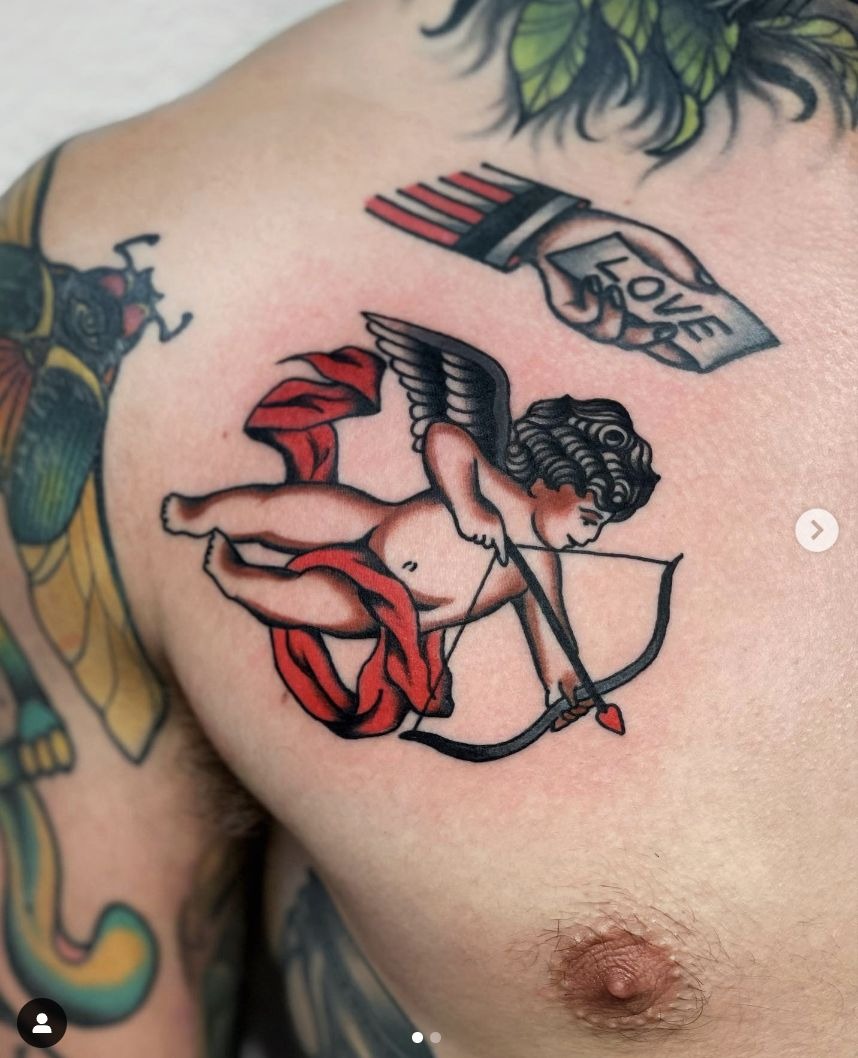 Red Ribbon American Traditional Cupid Tattoo Design