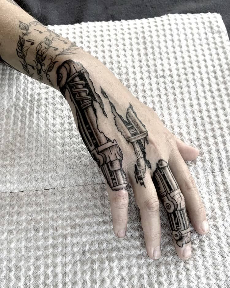 Biomechanical Hand Ripped Skin Effect Tattoo Design