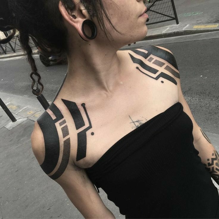 Bold Black Tech Patterns Across Shoulders Tattoo Design