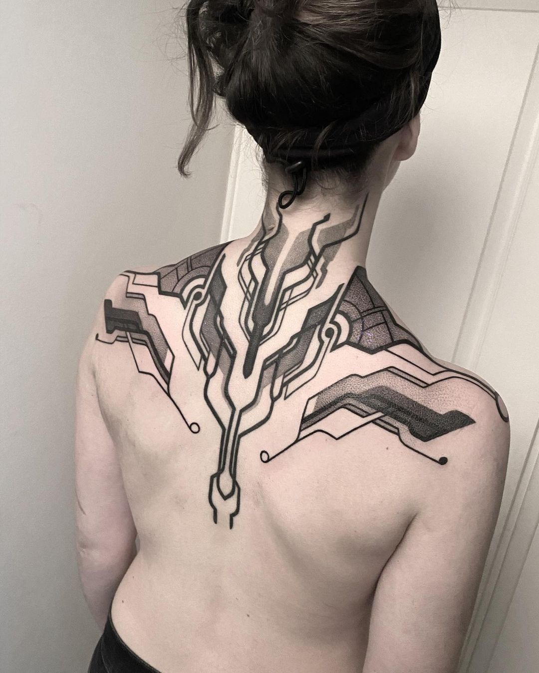 Futuristic Neck & Shoulder Overlay Tattoo Design