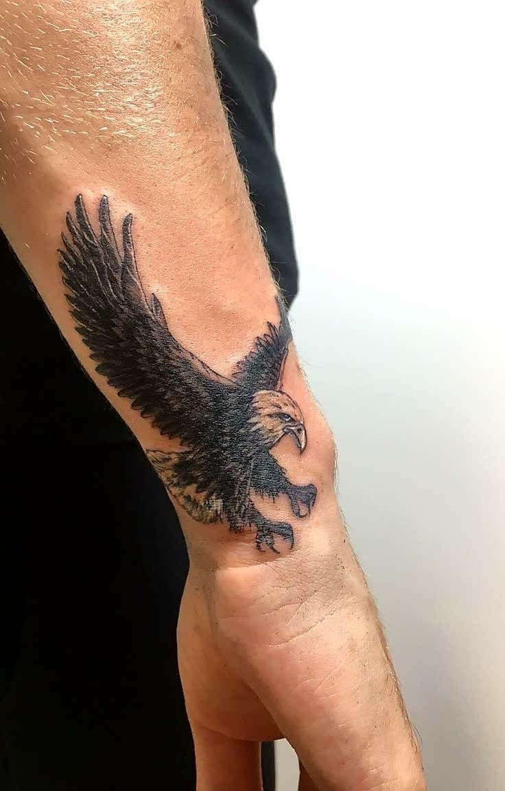 Small Eagle Near the Wrist Tattoo Design