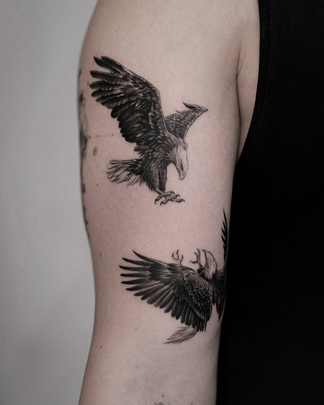 Two Small Eagles on the Upper Arm Tattoo Design