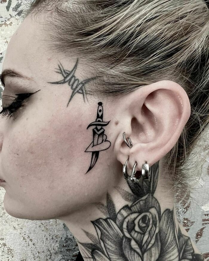 Dagger Through Heart Tattoo Design