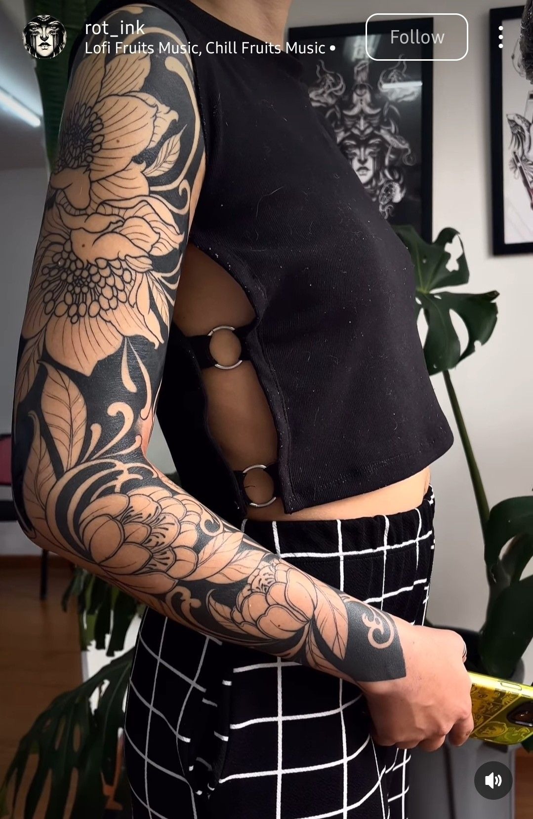 Bold Black Floral Sleeve Tattoo Design