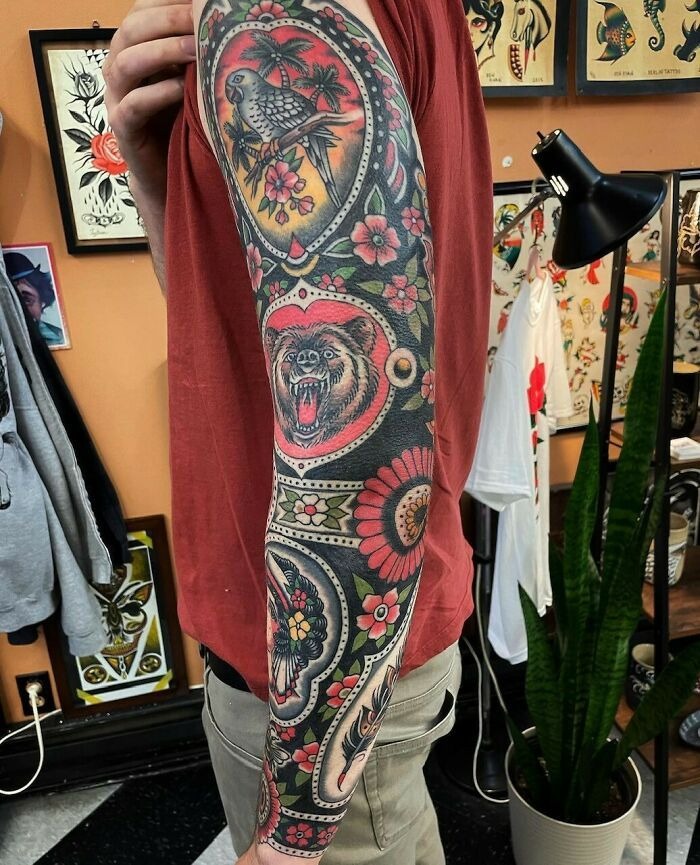 Colorful Traditional Sleeve with Animal Motifs Tattoo Design