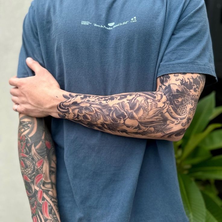 Japanese-Inspired Koi and Wave Sleeve Tattoo Design