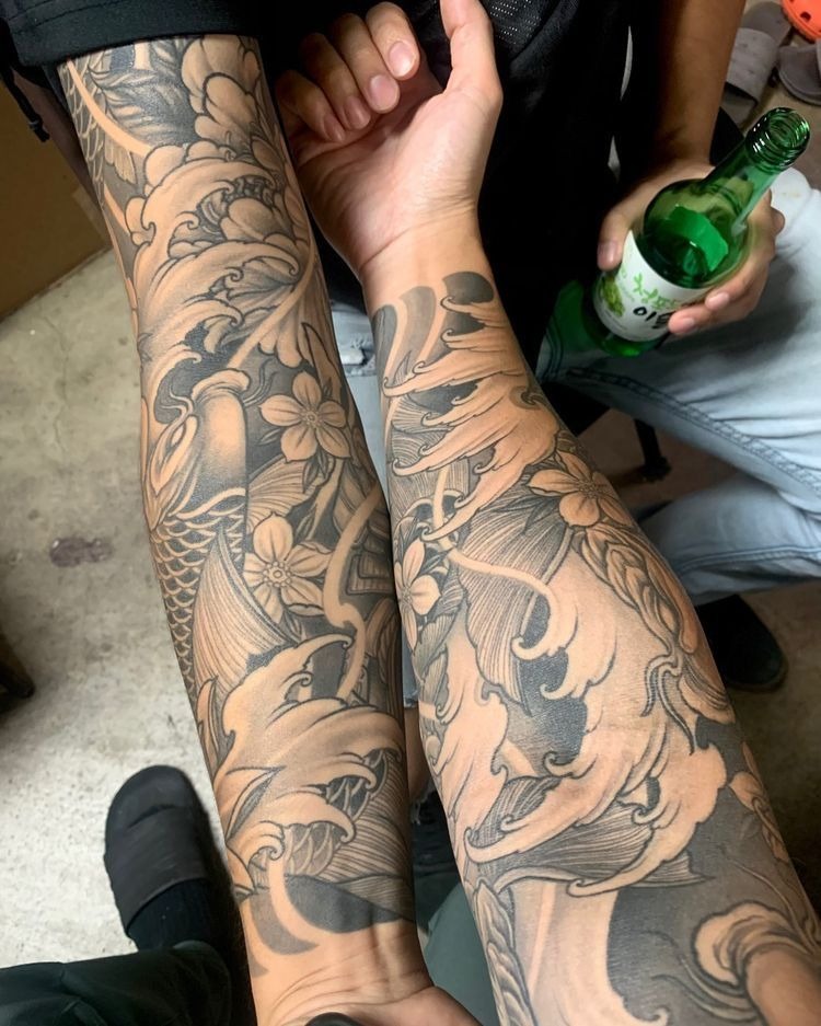 Twin Koi and Floral Waves Sleeve Tattoo Design