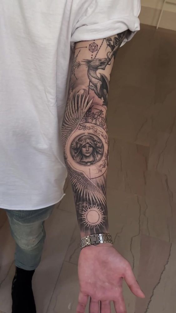 Winged Goddess and Mythical Elements Sleeve Tattoo Design