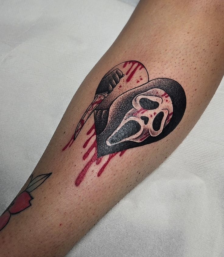 Bloody Ghostface in a Heart Tattoo Design