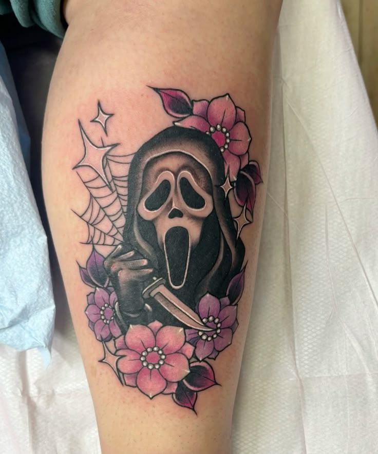 Ghostface Surrounded by Pink Flowers Tattoo Design