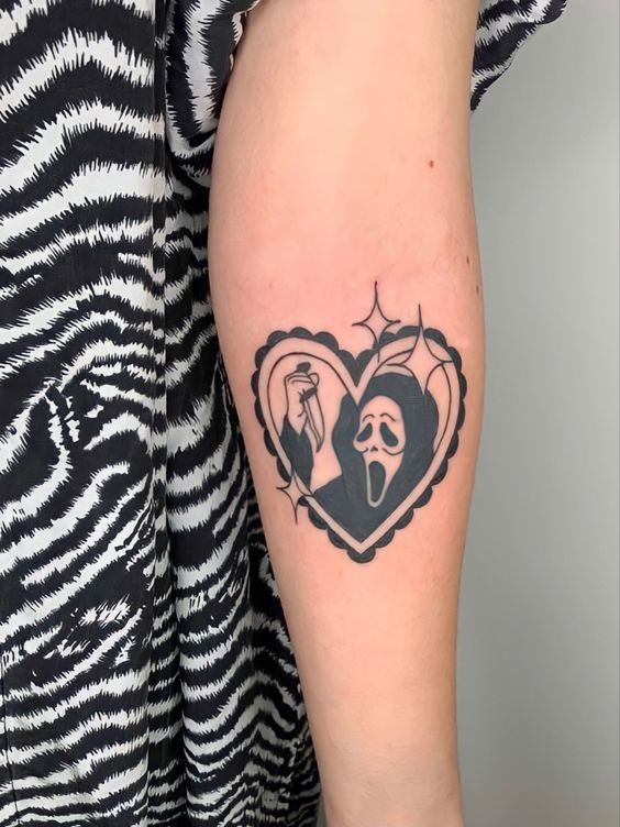 Heart-Shaped Ghostface with Stars Tattoo Design
