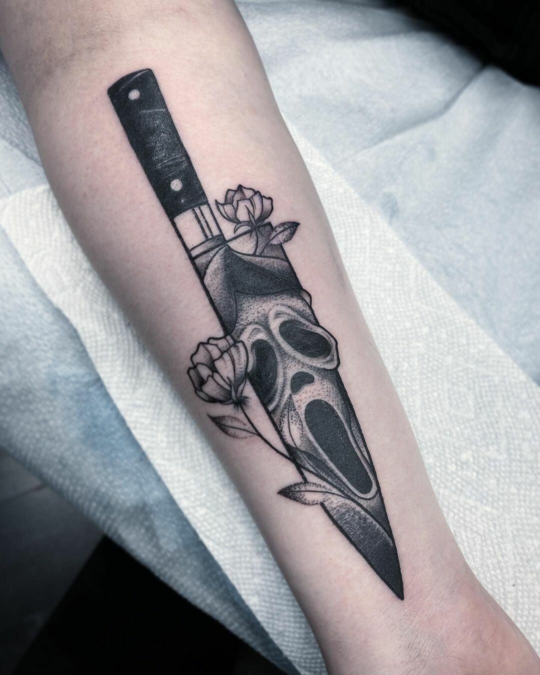 Knife with Ghostface Reflection and Roses Tattoo Design