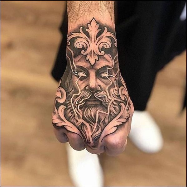 Mythical God Face Hand Tattoo Tattoo Design