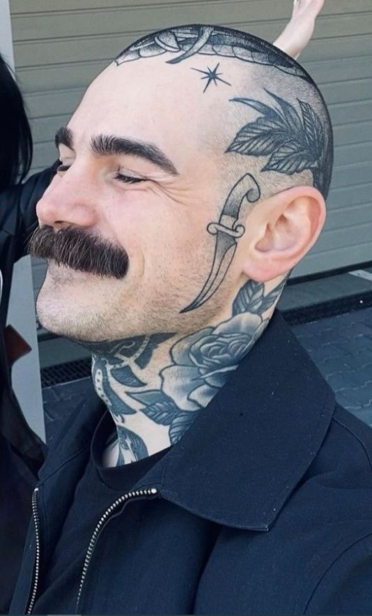 Symmetrical Blackwork Skull Crown Tattoo Design