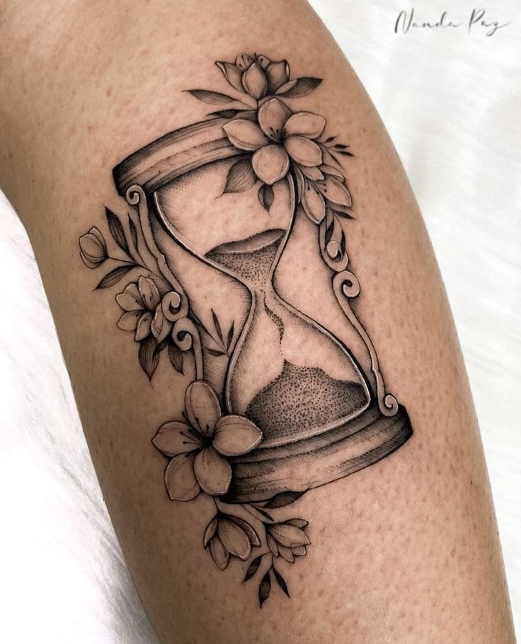 Blooming Hourglass with Floral Frame Tattoo Design