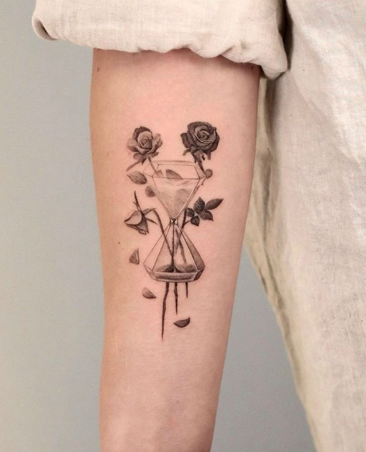 Geometric Hourglass with Falling Roses Tattoo Design
