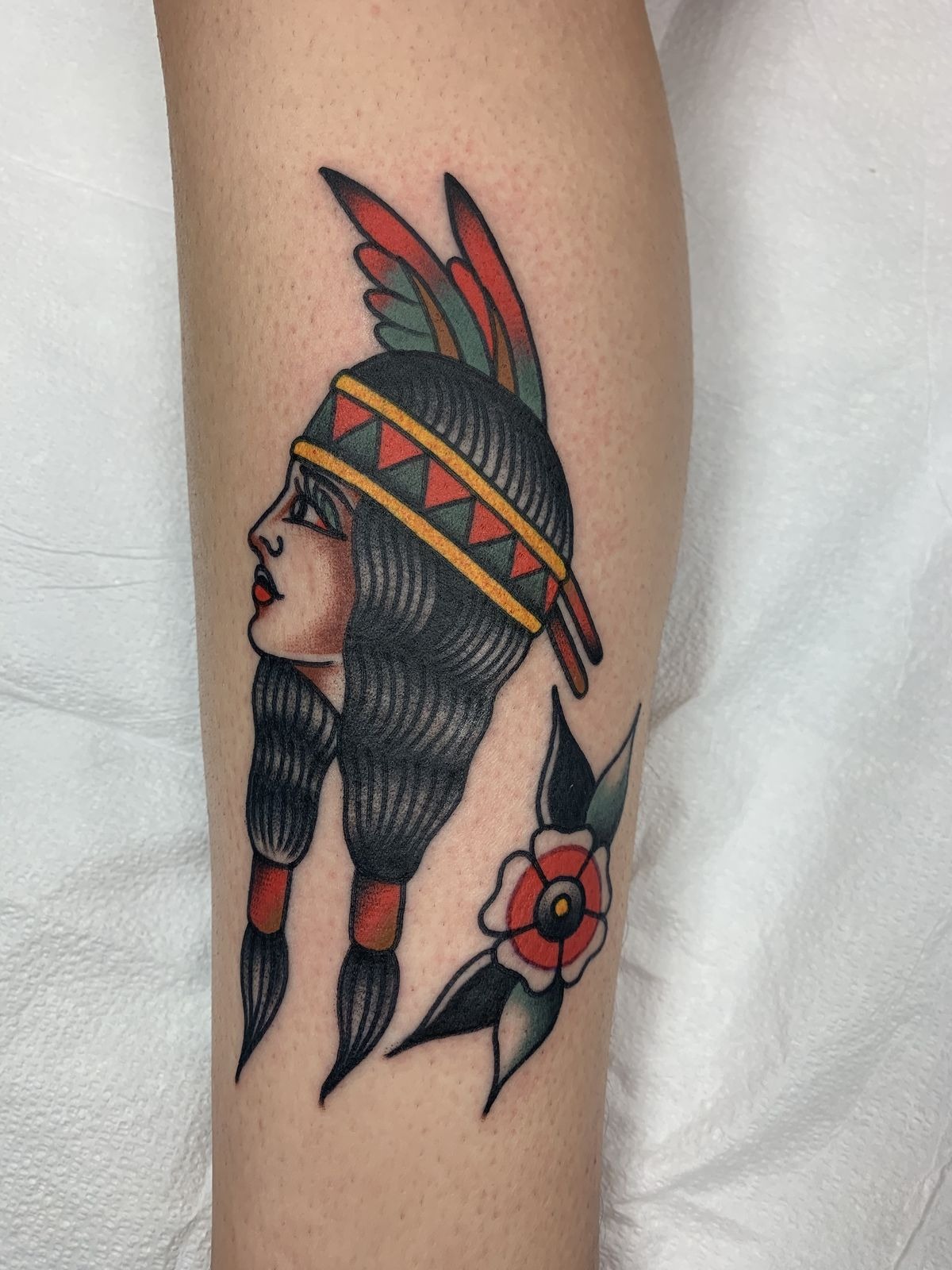 Colorful Traditional Profile with Floral Accent Tattoo Design