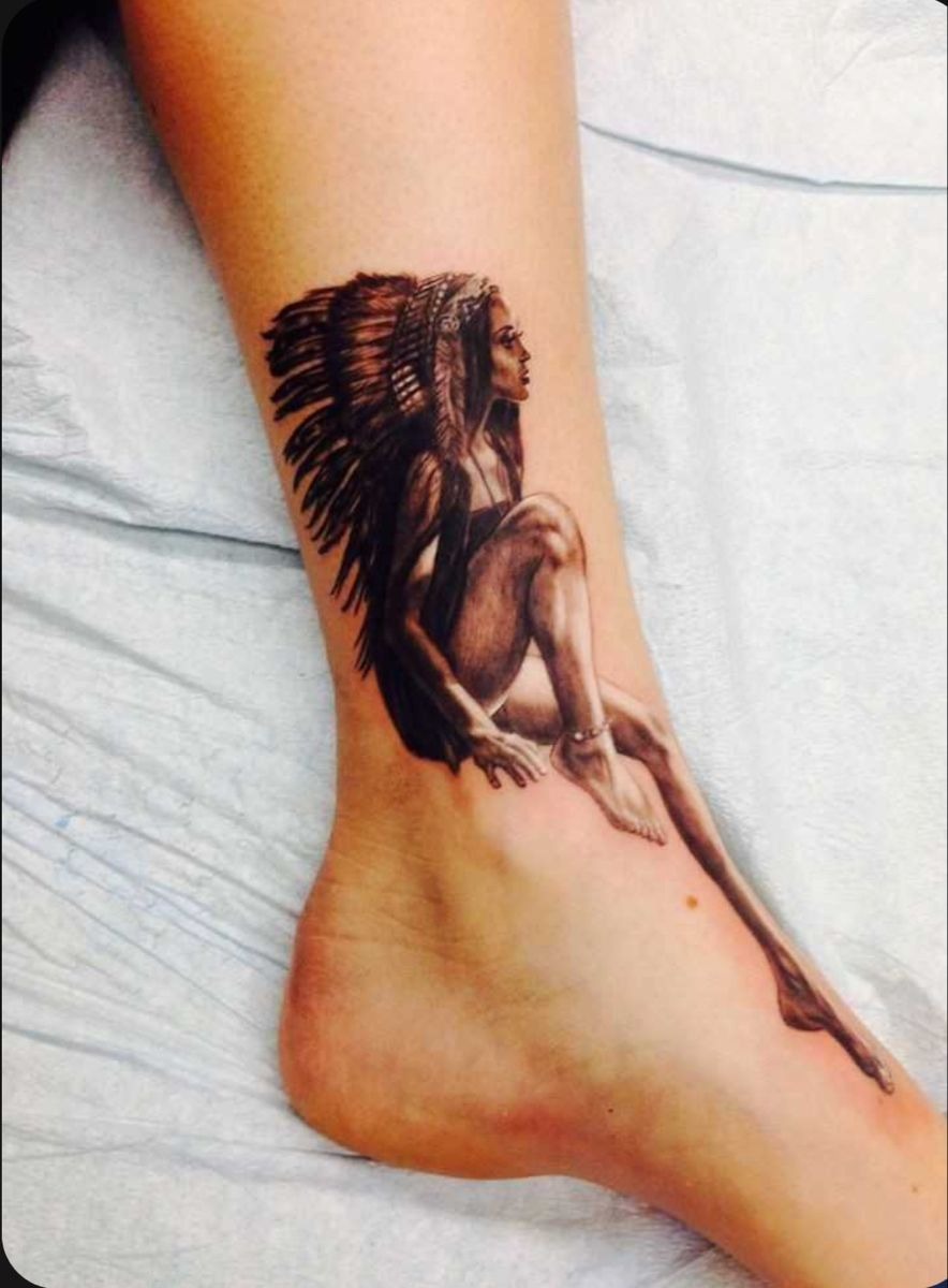 Elegant Sitting Figure with Feathered Headdress Tattoo Design