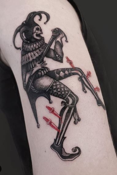 Gothic Jester with Piercing Details Tattoo Design