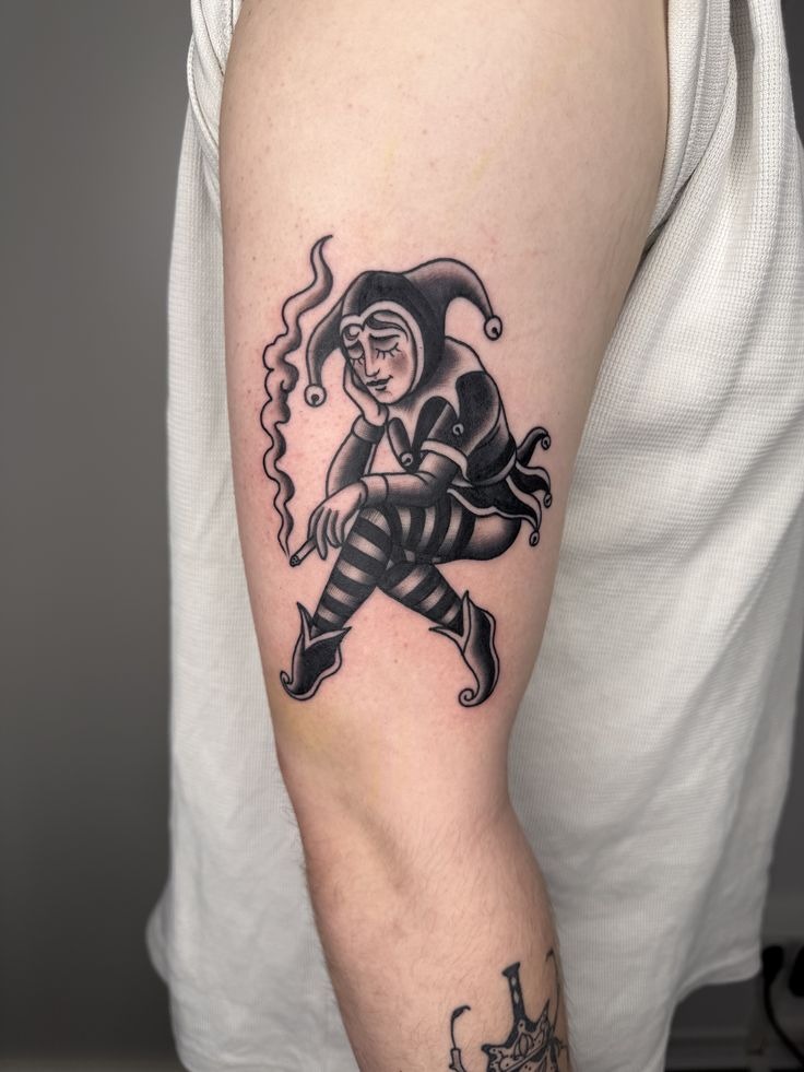 Melancholy Smoking Jester Tattoo Tattoo Design