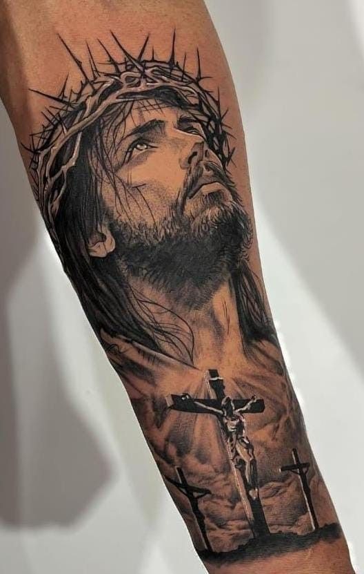 Crucifixion Wrist Tattoo with Rays of Light Tattoo Design