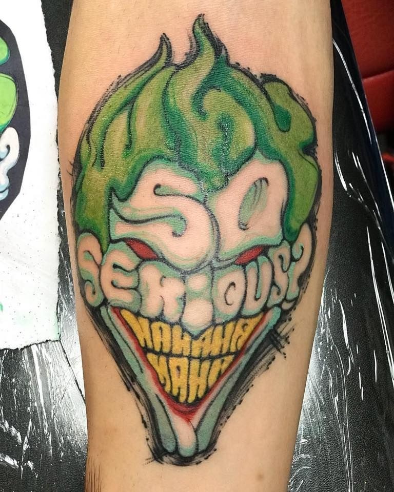 Bright Cartoon Face Design, a tattoo design rendered in clean detailed linework for the arm.