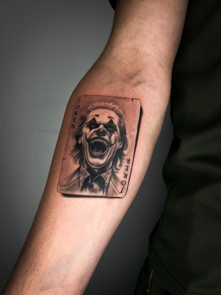 Laughing Card Portrait, a tattoo design rendered in bold.