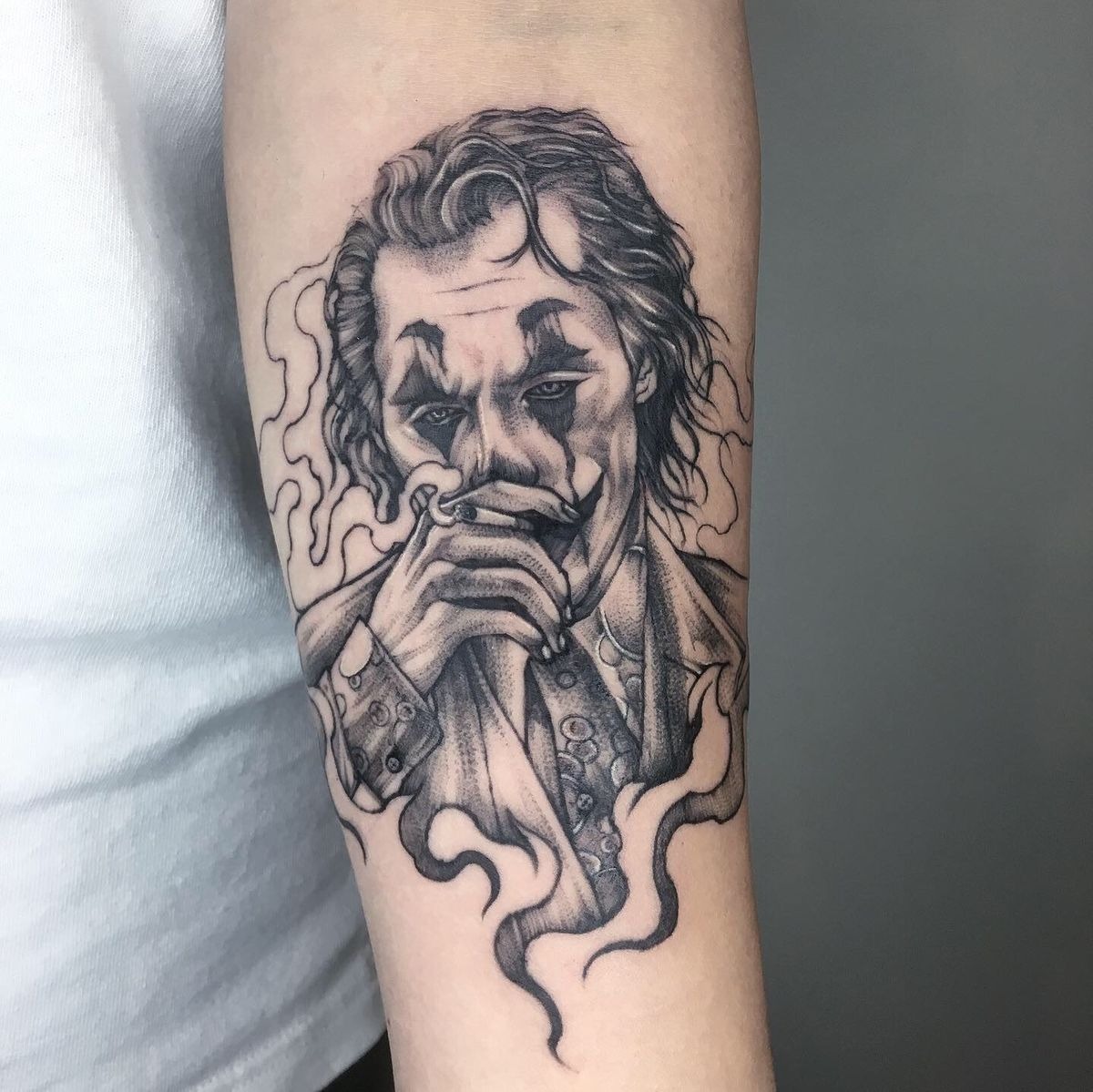 Smoke-Framed Portrait, a tattoo design rendered in clean detailed linework for the hand.