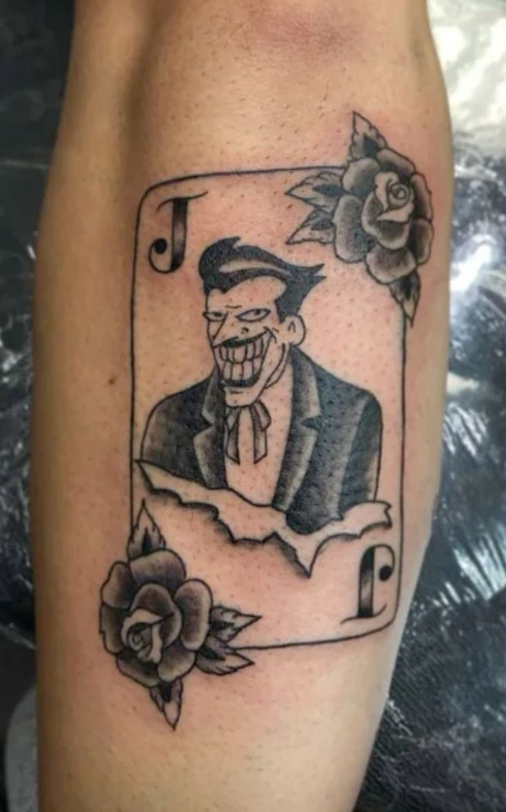Vintage Joker Card With Roses, a tattoo design rendered in clean detailed linework for the arm.
